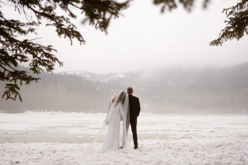 Couple looking off into the distance at their Bear Lake elopement ceremony