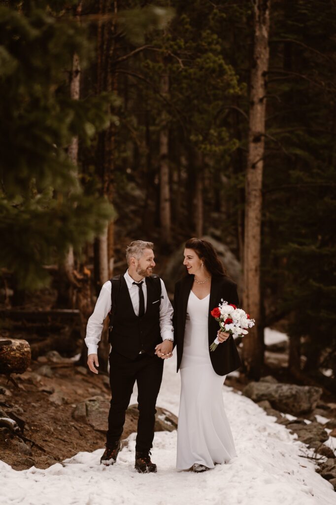 Couple hiking to Dream Lake after their wedding ceremony