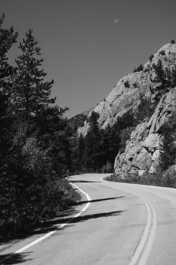 Moon and Colorado mountain road