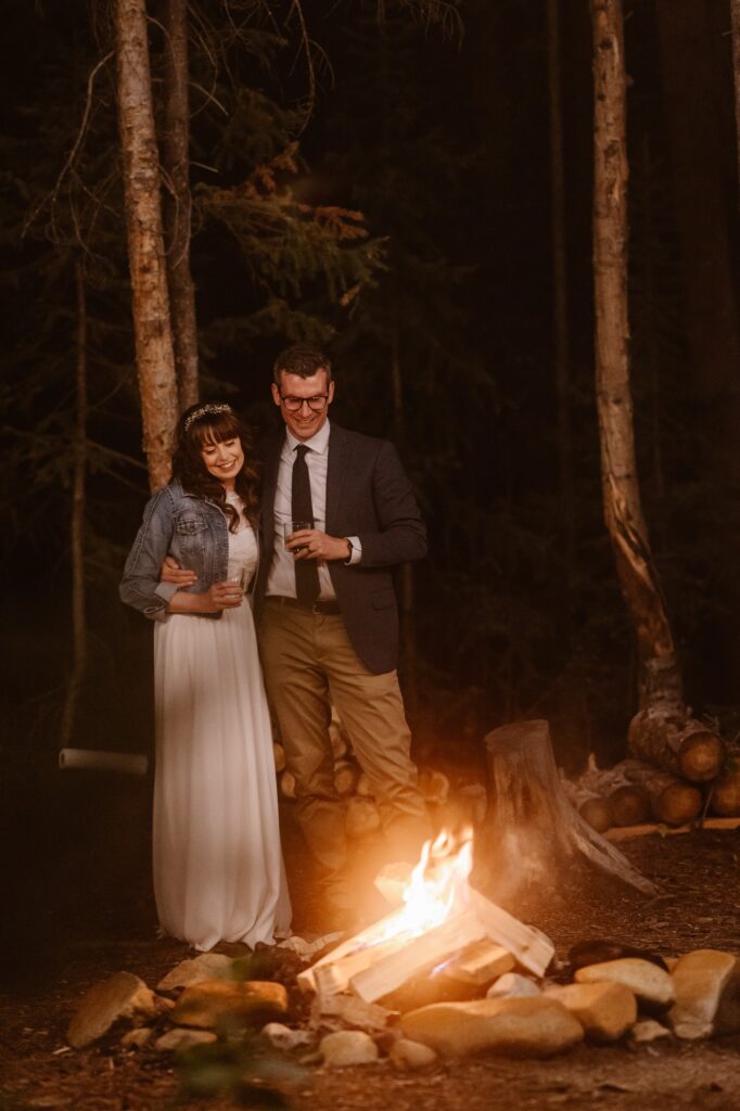 Adventure elopement day coming to a close around a campfire