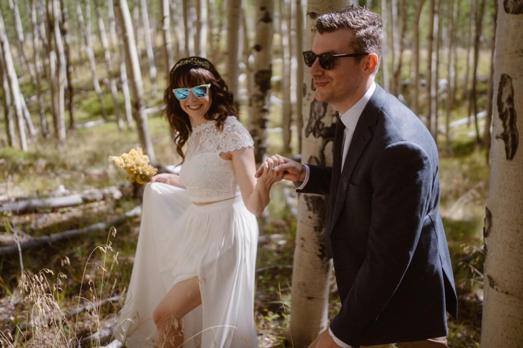 Couple hiking at their adventure elopement in Colorado