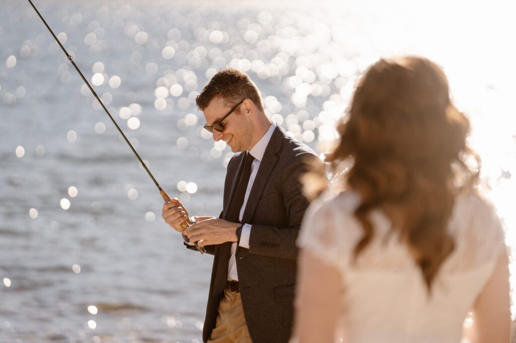 Fly fishing at adventure elopement in Colorado