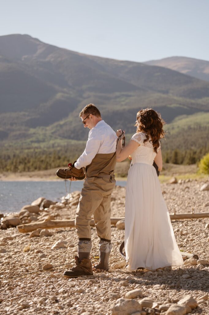 Bride and groom fly fishing