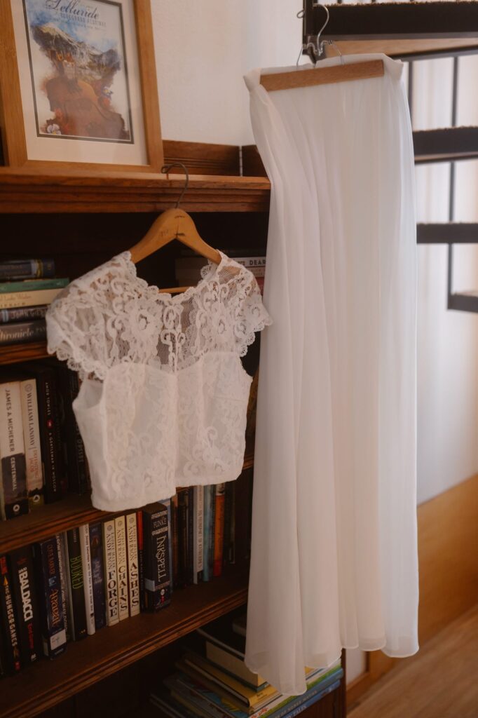 Wedding dress on bookshelf