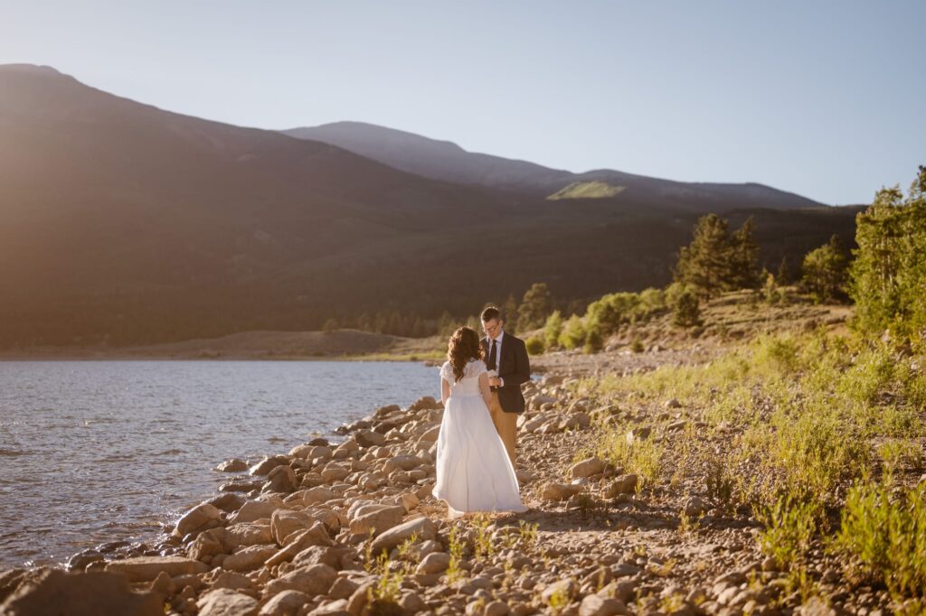 Couple exchanging vows during adventure elopement