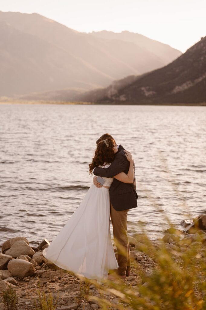 Couple hugging after elopement ceremony