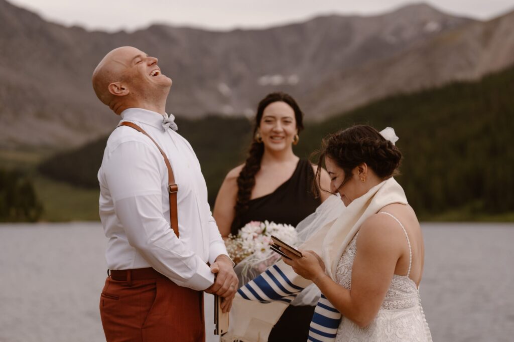 Couple exchanging vows in the mountains of Breckenridge, Colorado