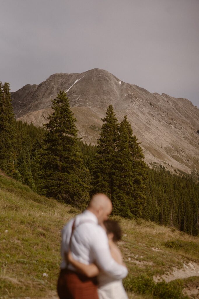 First dance with mountains in the background on couple's elopement day