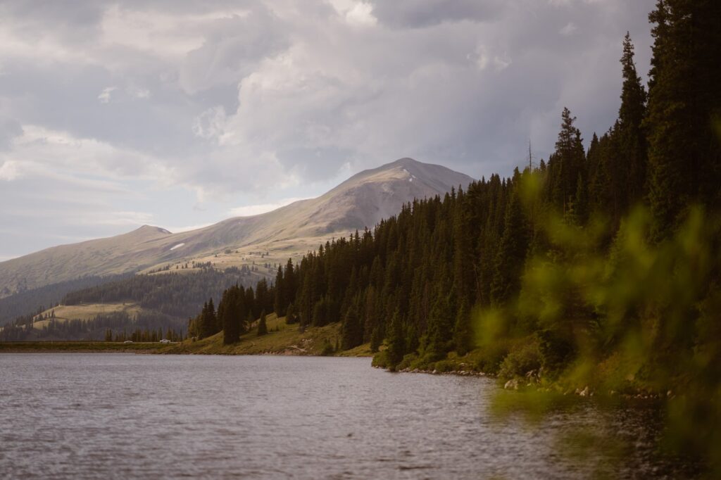 View of mountains, forest, and lake in Breckenridge, Colorado