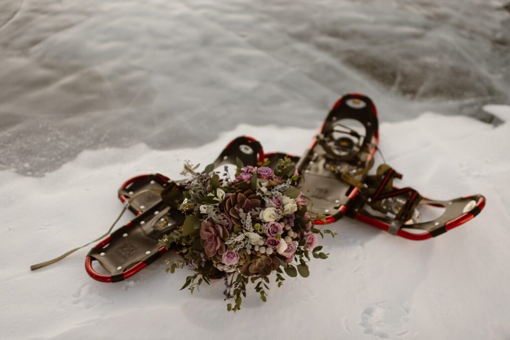 Snowshoes with wedding flowers