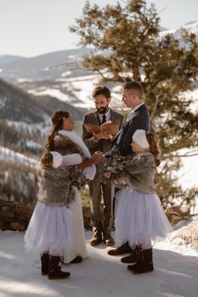 Snowy wedding ceremony at Sapphire Point Overlook 