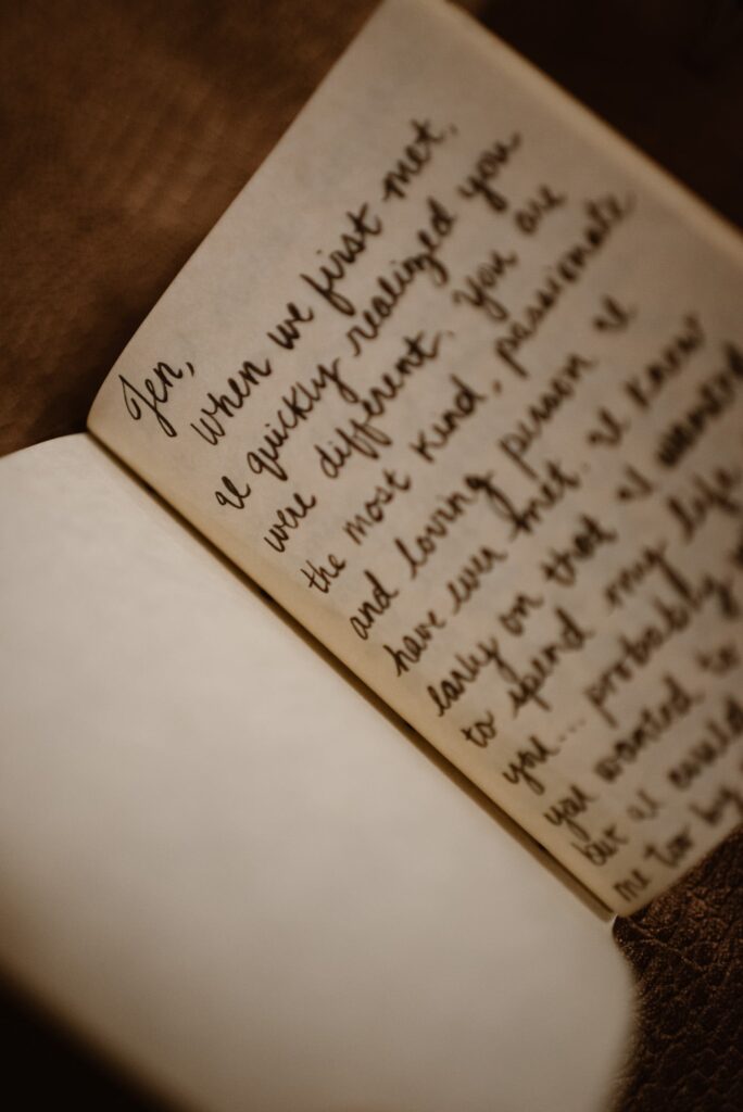 Handwritten vows inside leather book