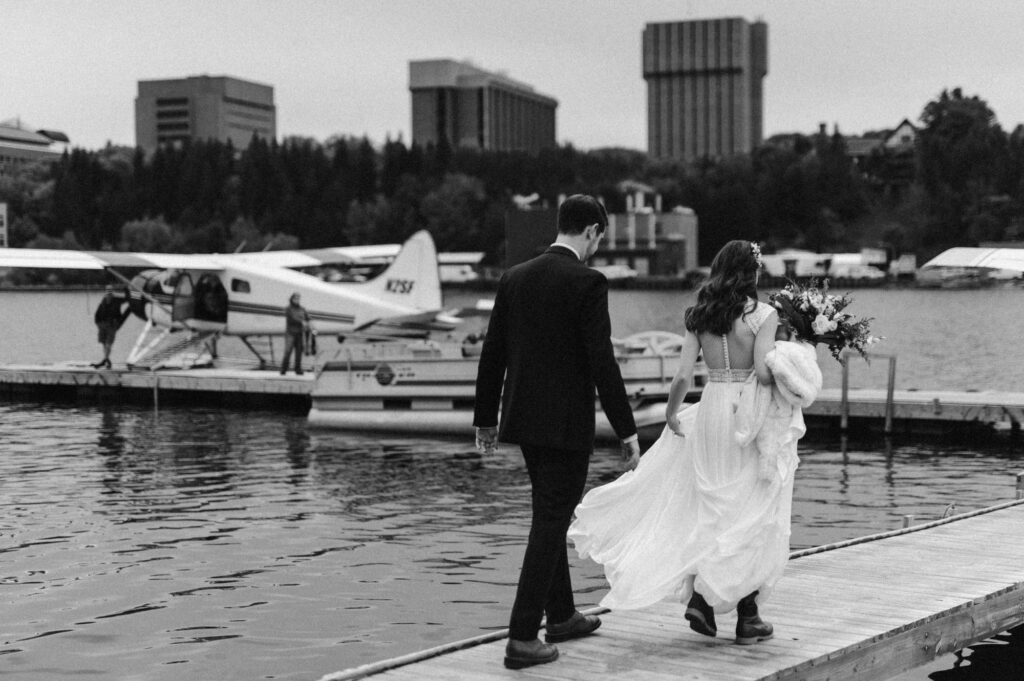 Bride and groom loading onto a float plane to fly to their National Park elopement 