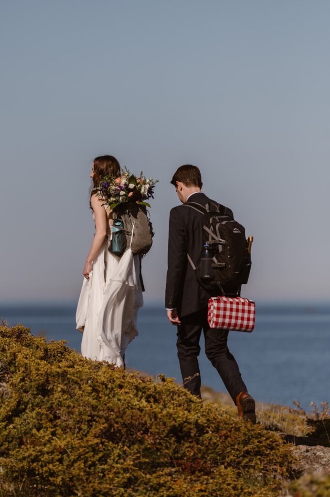 Couple hiking on their wedding day