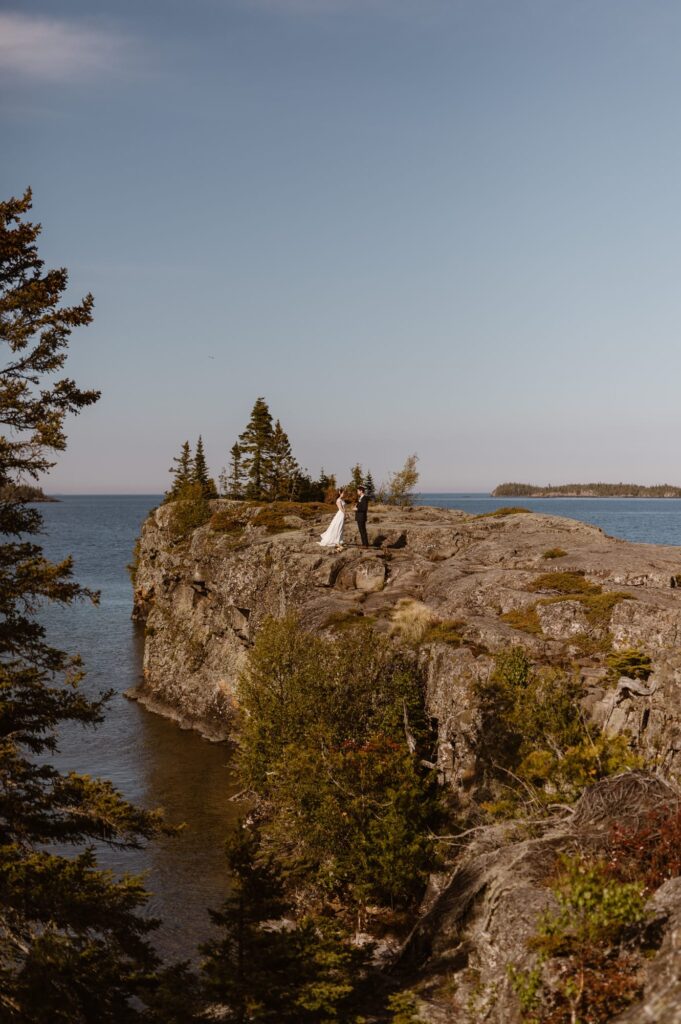 Couple exchanging vows at a private and secluded spot on Lake Michigan