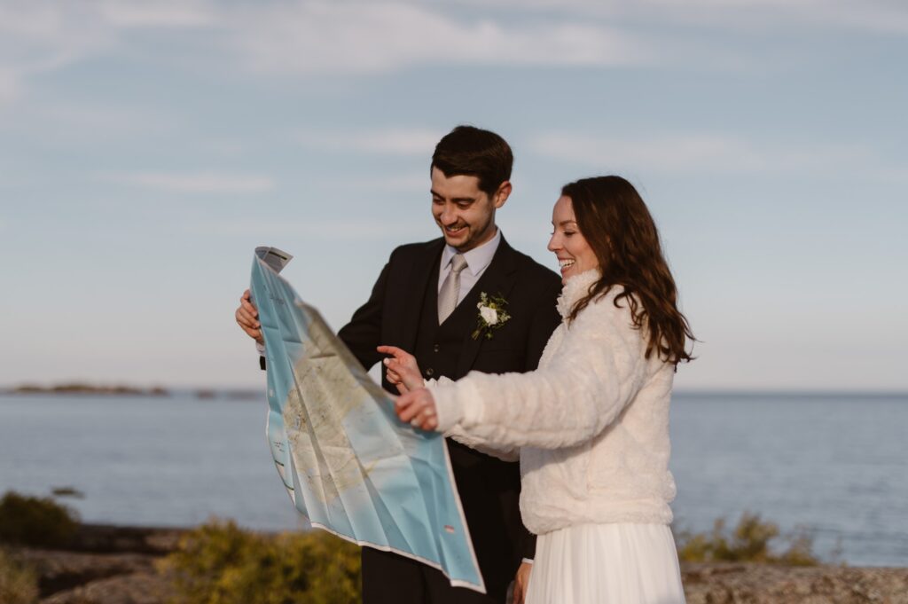 Couple looking at Isle Royale National Park map 