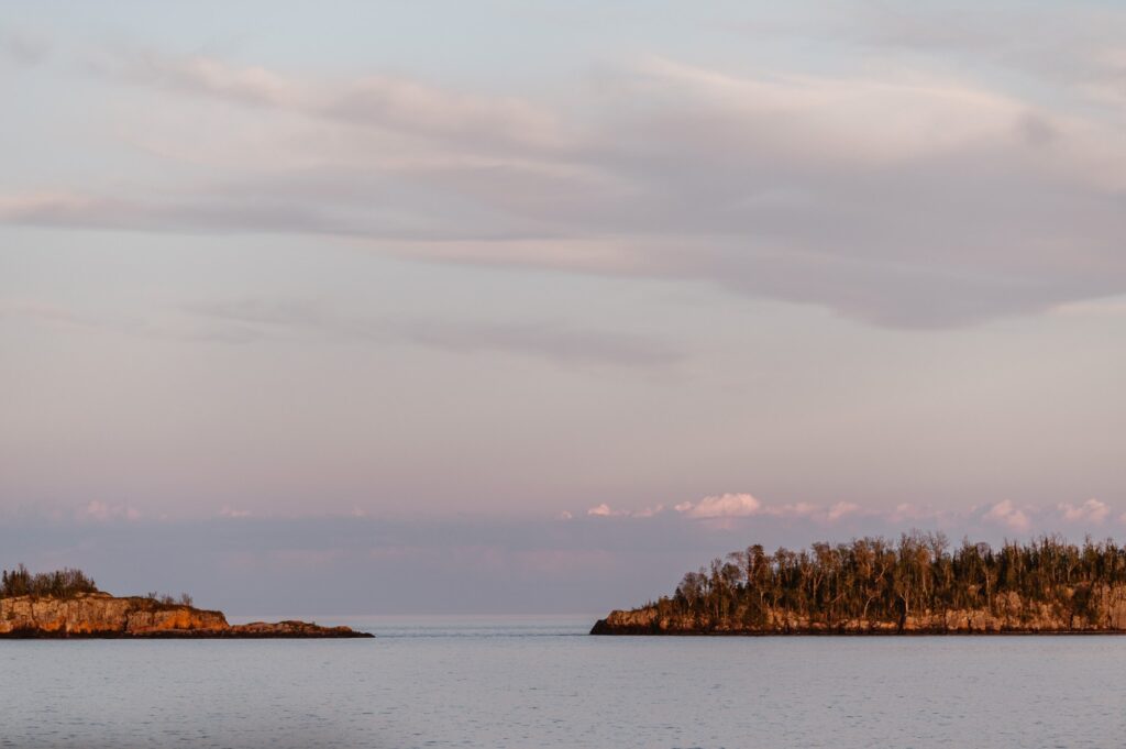 Stunning pink sunset on the water at Isle Royale National Park