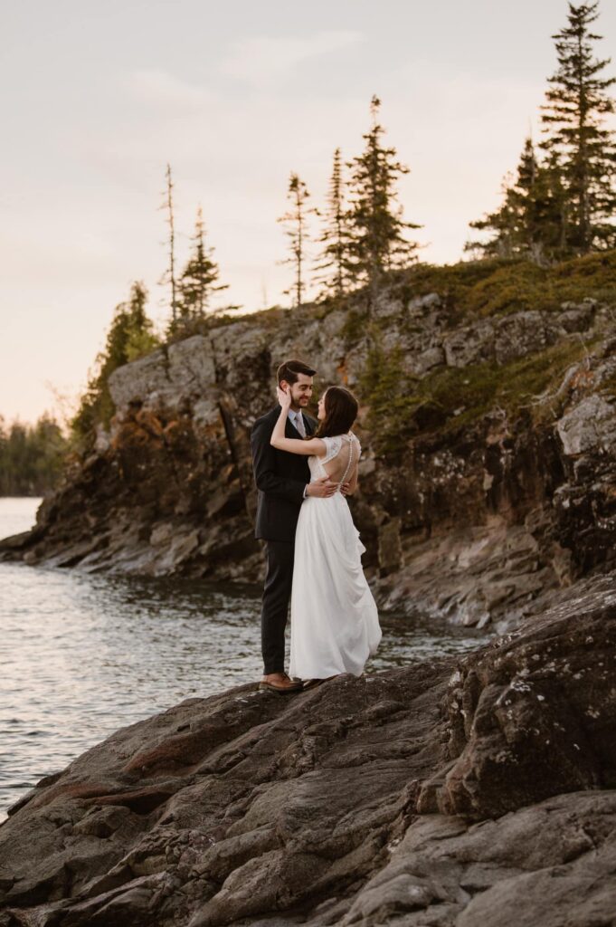 Elopement portraits on the shore of Isle Royale National Park