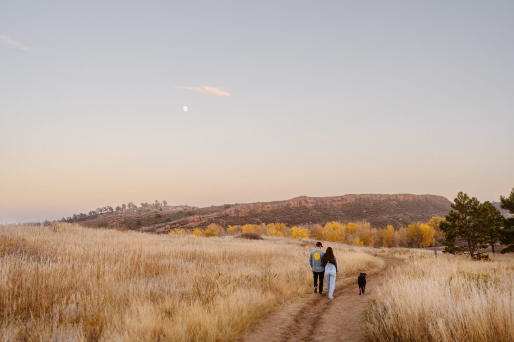 Couple walking off into the distance in Lory State Park