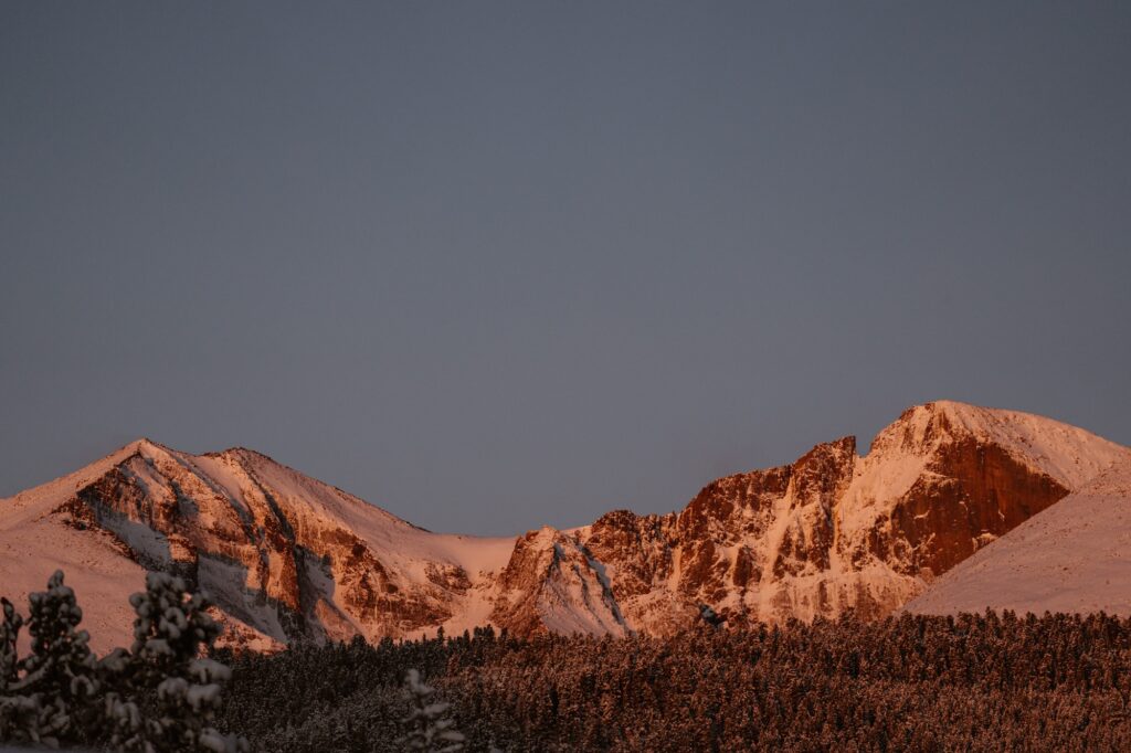 Alpenglow on Longs Peak in Rocky Mountain National Park as seen from Lily Lake