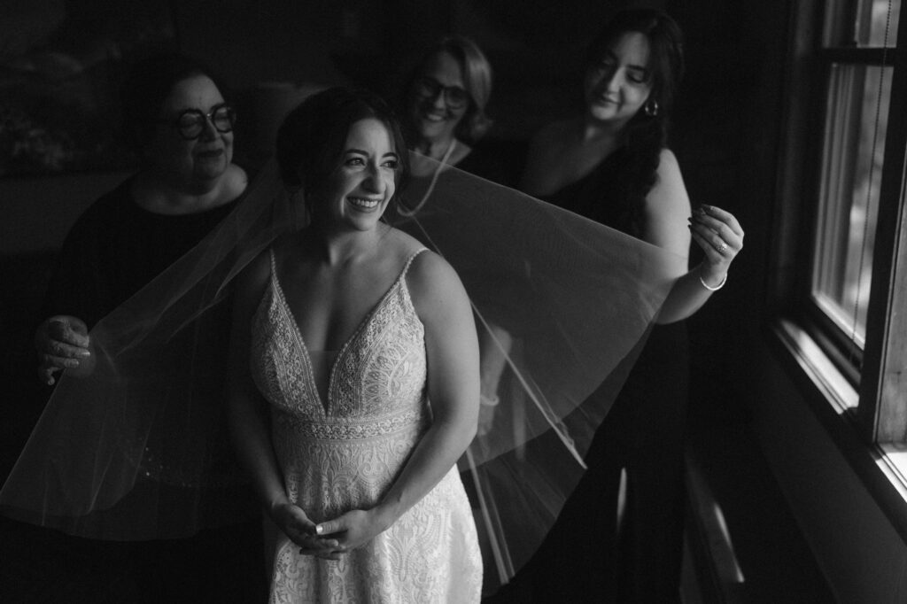 Bride surrounded by her family during her Colorado micro wedding
