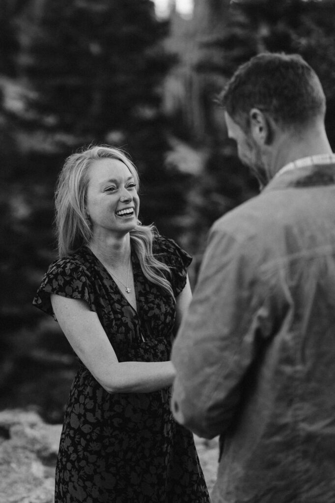 Couple laughing and having fun during their engagement session