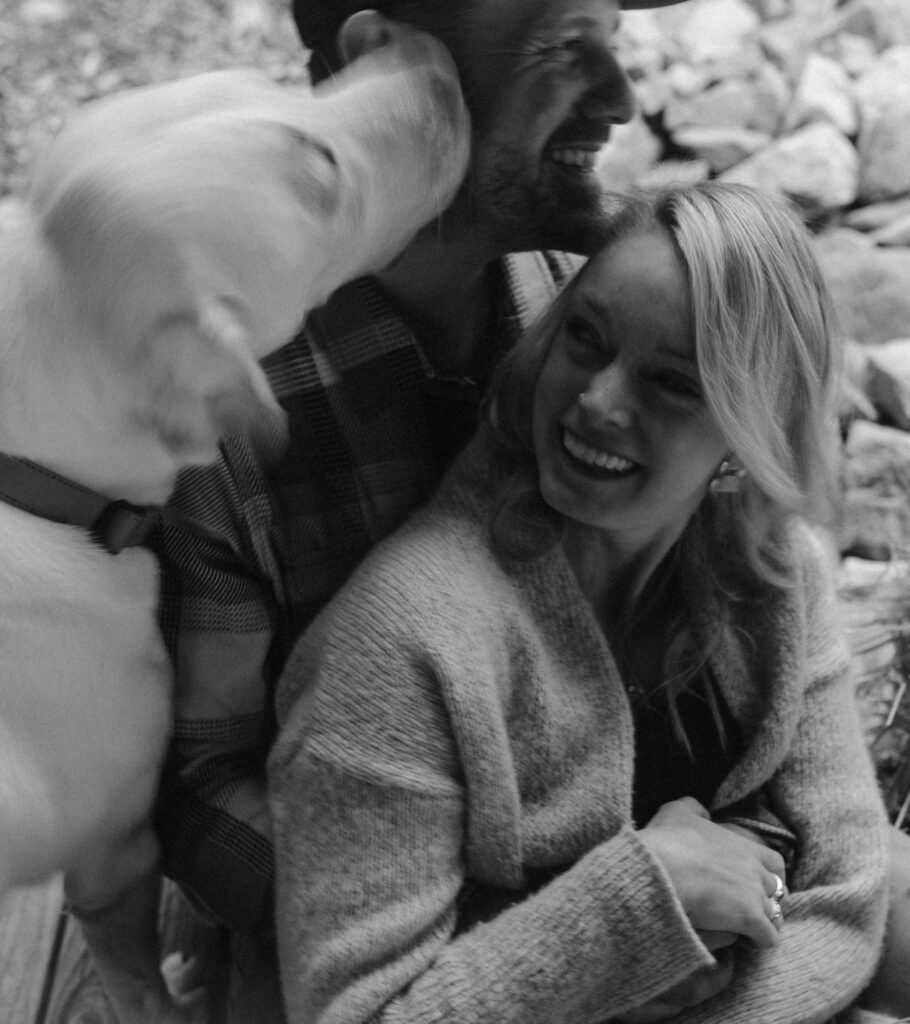 Engagement session snuggles with family dog