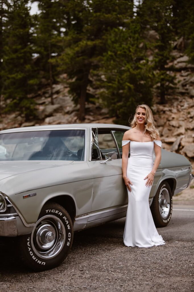 Vintage wedding day car with bride