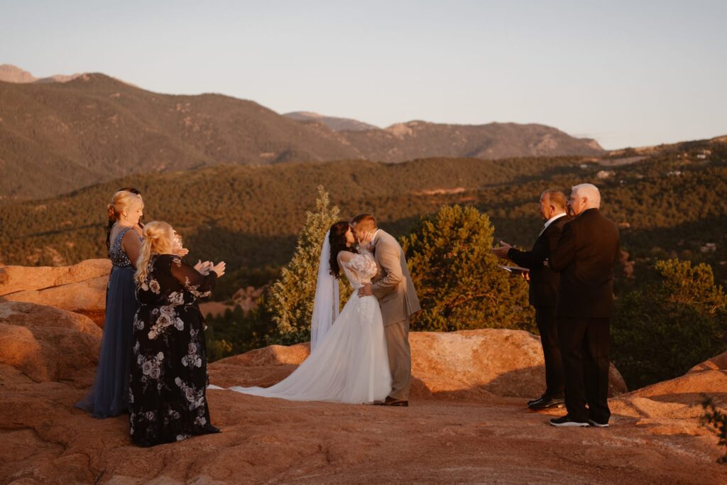 First kiss during wedding at Garden of the Gods