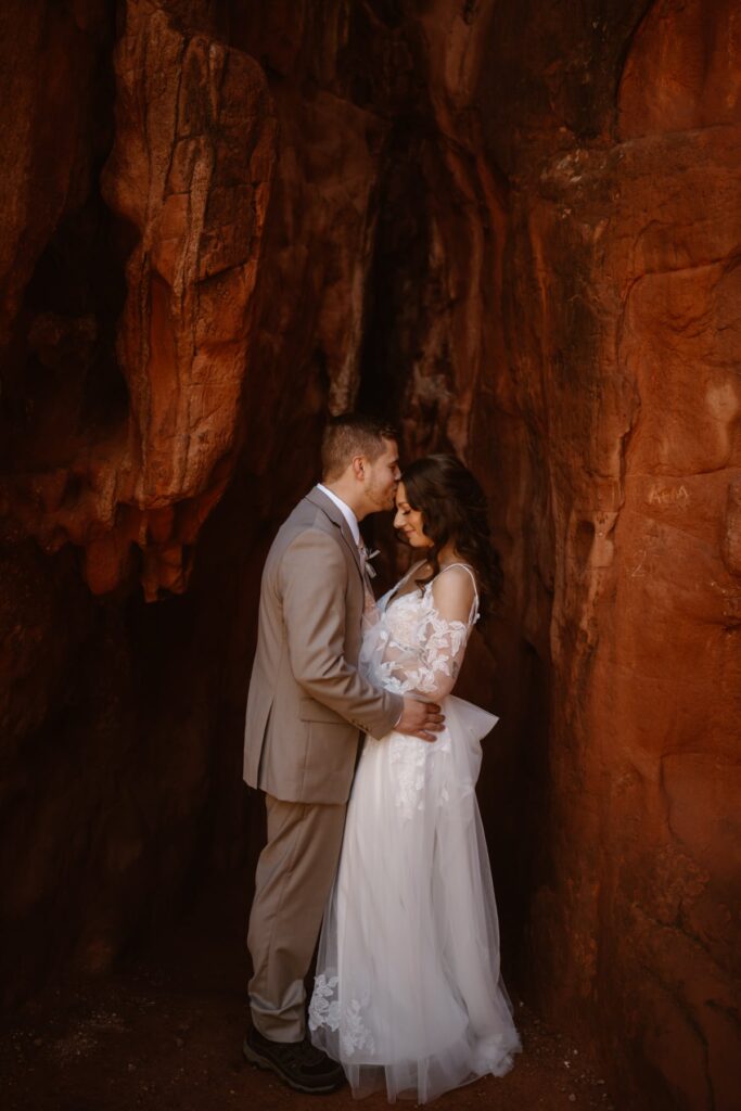 Bride and groom portraits in the red rocks at Garden of the Gods