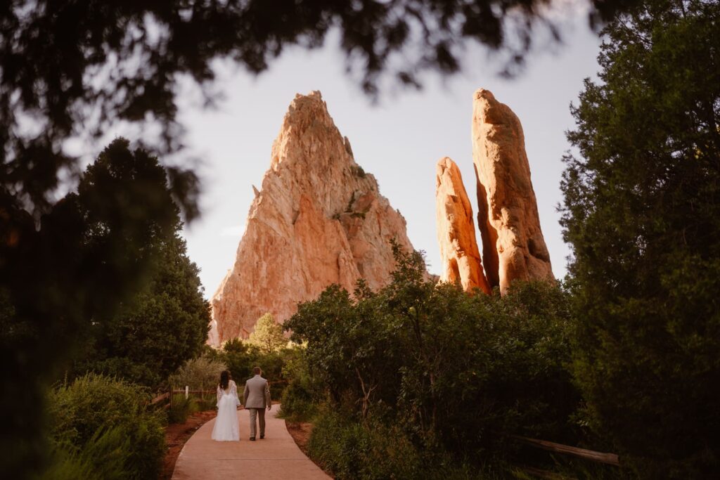 View of couple walking down the path in Garden of the Gods on their wedding day