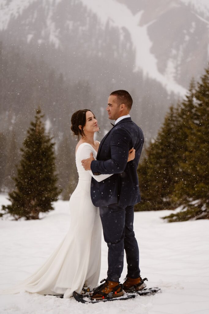 Couples portraits in the snowy mountains