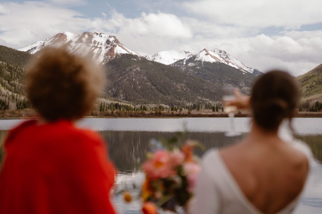 Bride looking off into the distance at the mountains in Ouray, Colorado