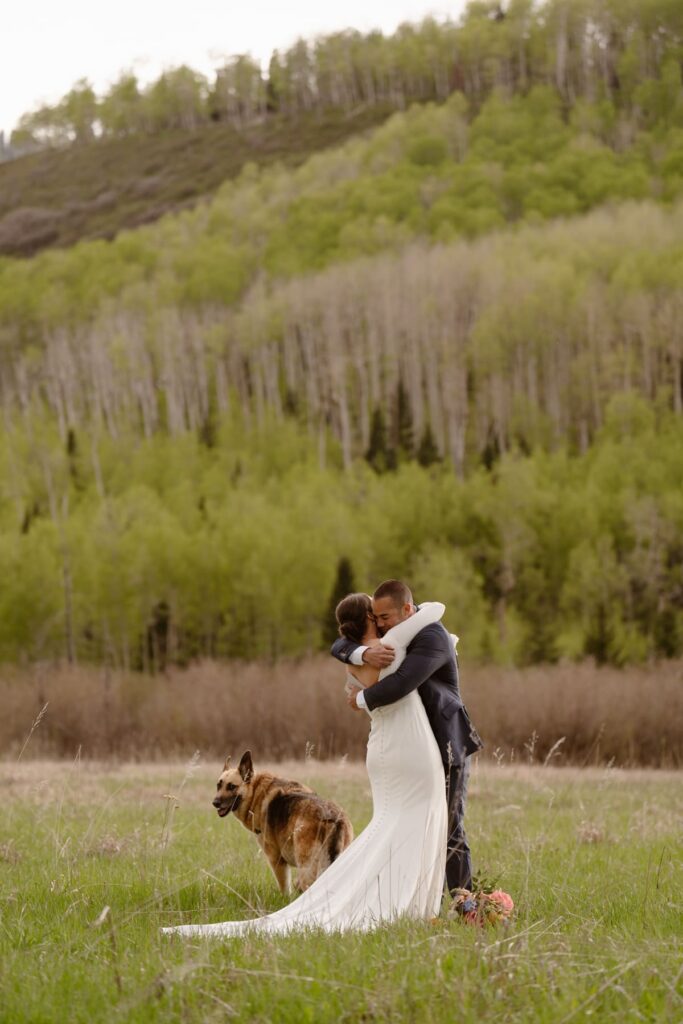 Couple hugging after wedding ceremony in Ouray, Colorado