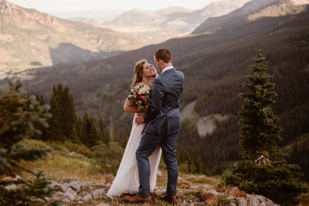 Couple takes a wedding day hike in Telluride, colorado