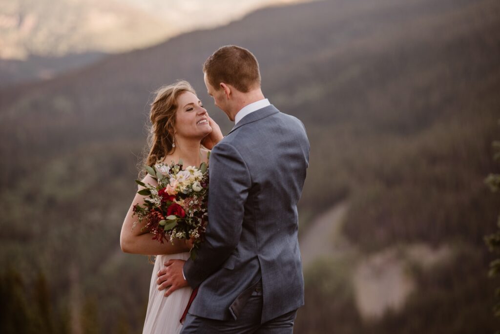 Couple in the mountains on their wedding day