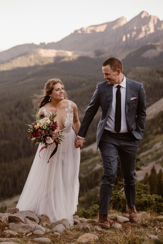 Couple hiking on their wedding day in Telluride, Colorado