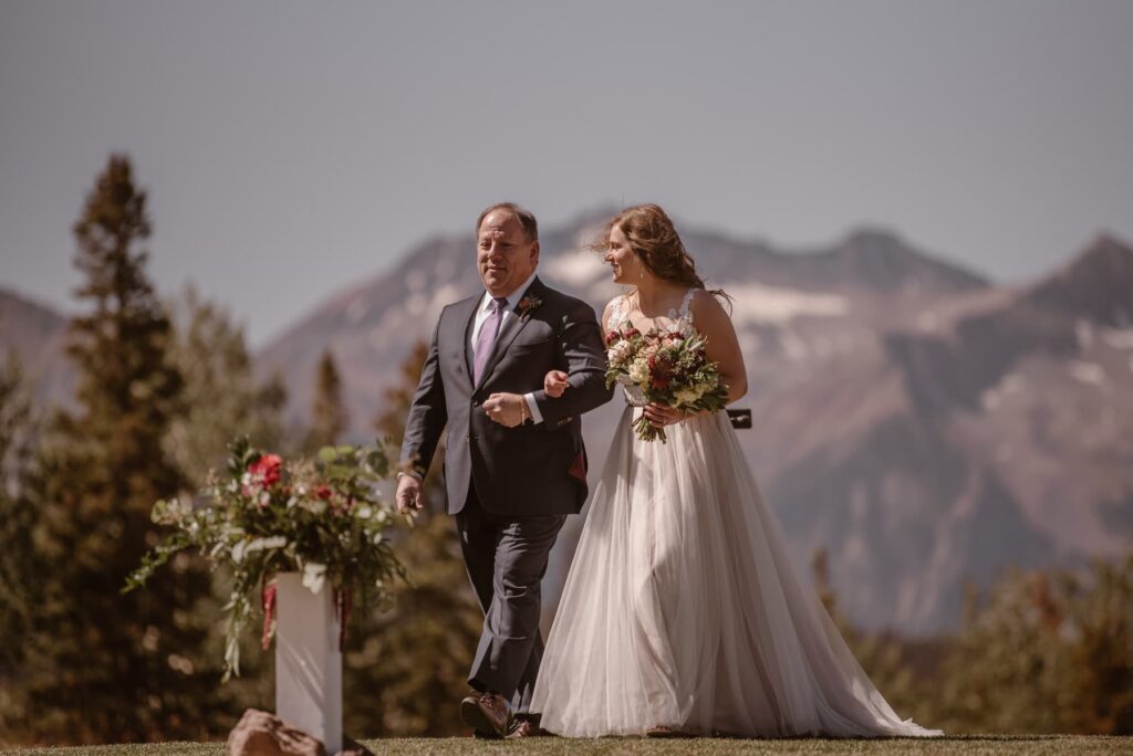 Couple getting married at San Sophia Overlook with great mountain views