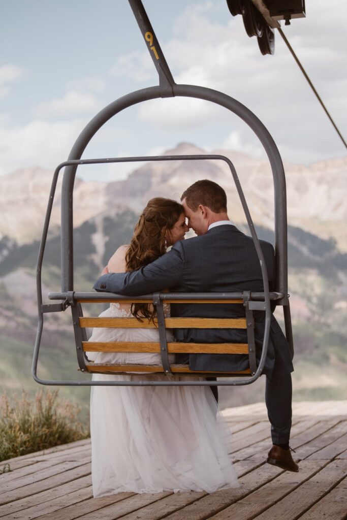 Wedding couple on a ski lift in Telluride
