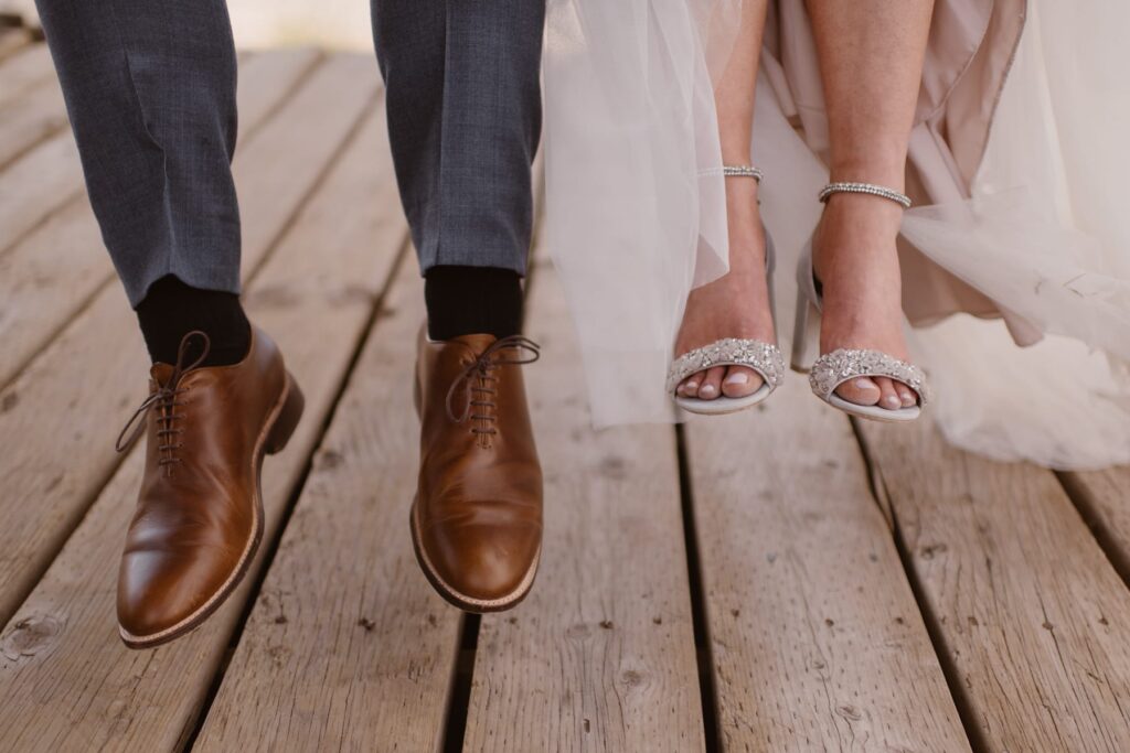 Bride and groom footwear on a ski lift