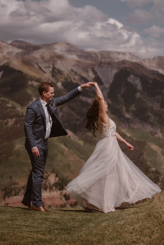 Couple frolicking in the mountains at San Sophia Overlook
