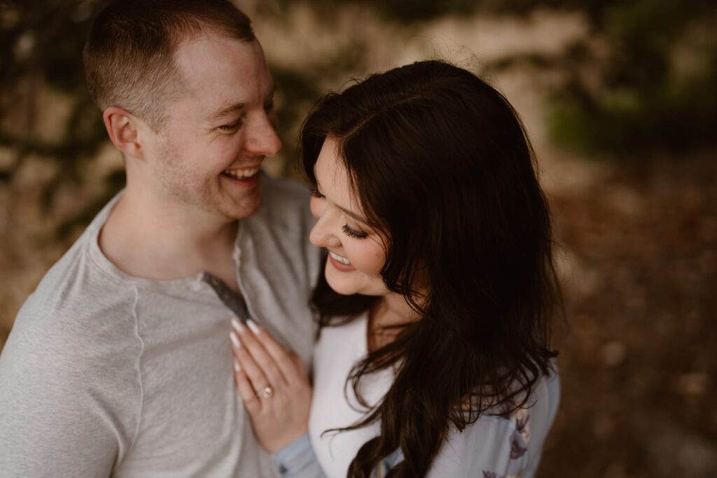 Close up of couple laughing during their engagement photos