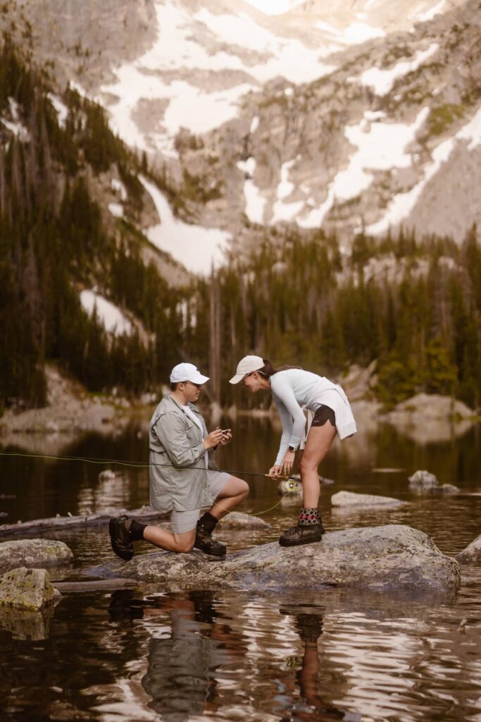 Surprise proposal at Dream Lake in Estes Park, Colorado while fly fishing